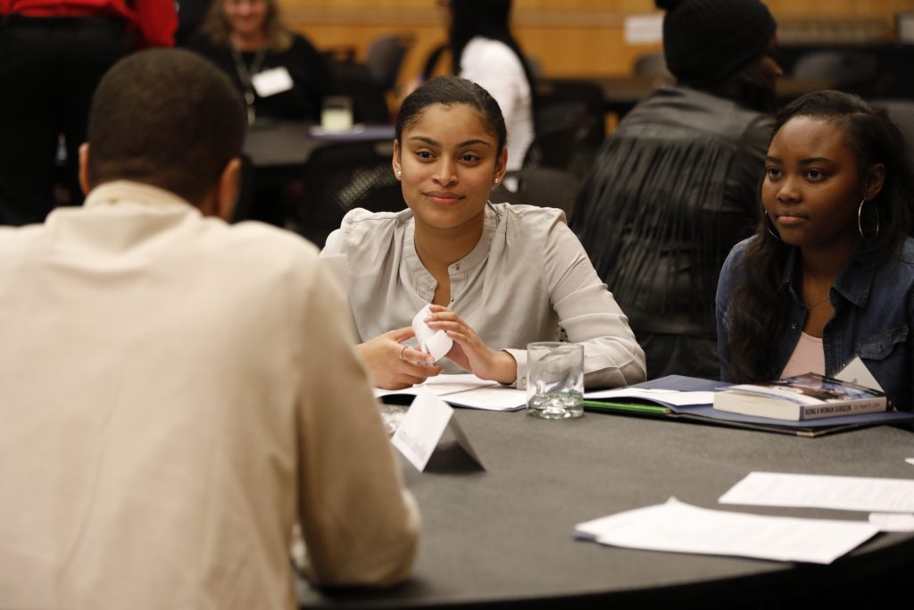 Students speak with alumni at the IUPUI student-alumni career connections event.
