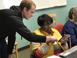 IUPUI student works with senior citizen on technology skills