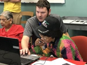 IUPUI student works with senior citizen on technology skills