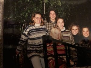 Photo of Kristin Norris with volleyball teammates in Alaska in 1997.