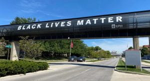 Photo of Black Lives Matter sign on IUPUI connector tube. 